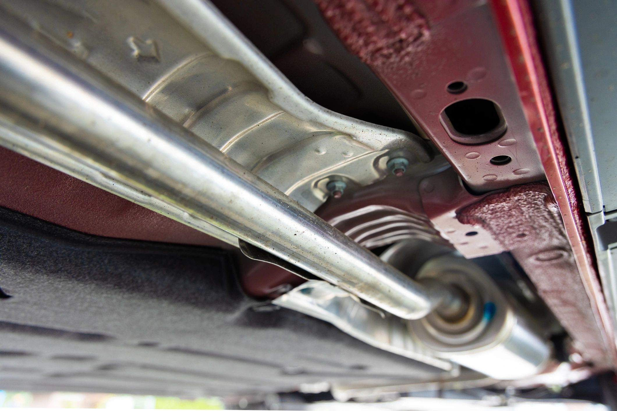 Exhaust components under a vehicle