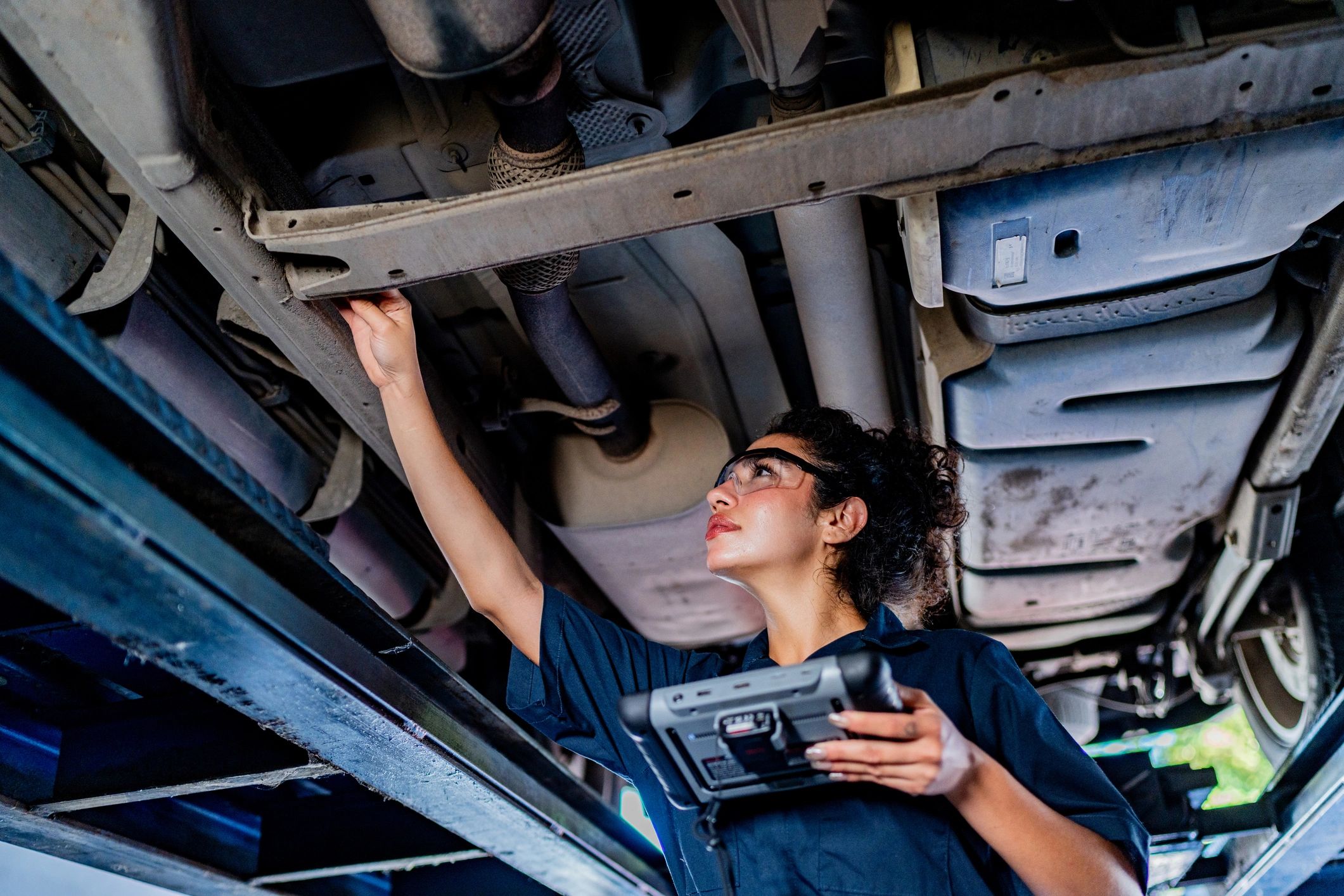 Customer portrait in an auto repair shop setting